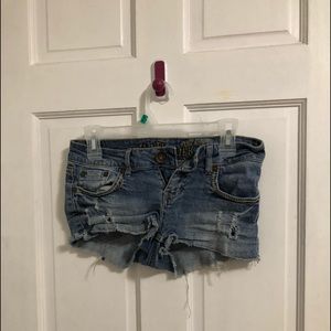light wash distressed jean shorts